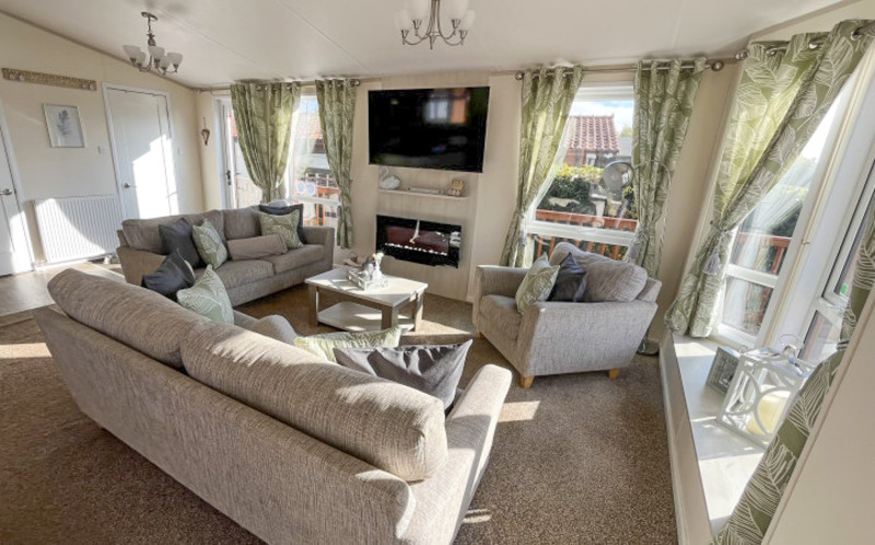 Atlas Lilac Lodge 2016 on lakeside pitch at Tattershall Lakes Country Park, Lincolnshire