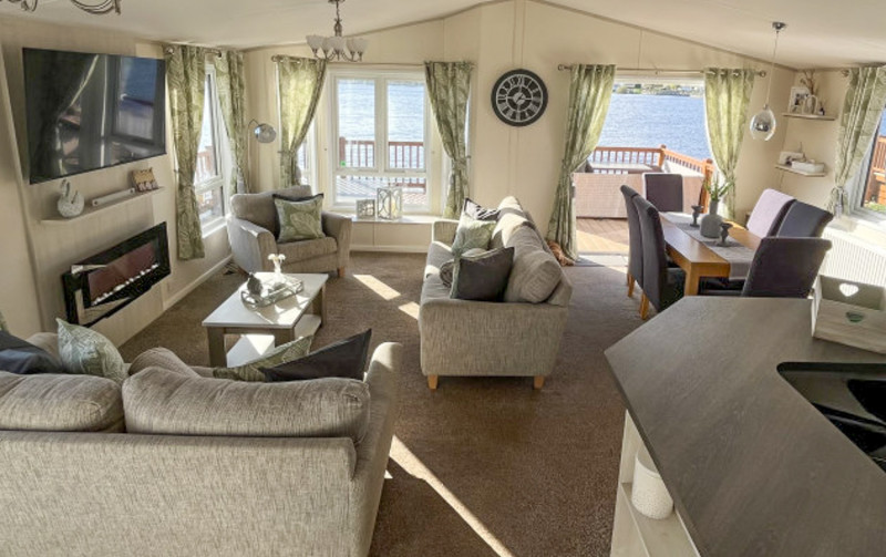 Atlas Lilac Lodge 2016 on lakeside pitch at Tattershall Lakes Country Park, Lincolnshire