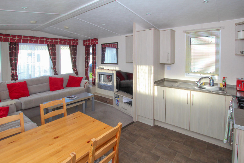 Victory Vision 2014 + decking at Pevensey Bay Holiday Park, East Sussex. 3 bedrooms / 6 berth