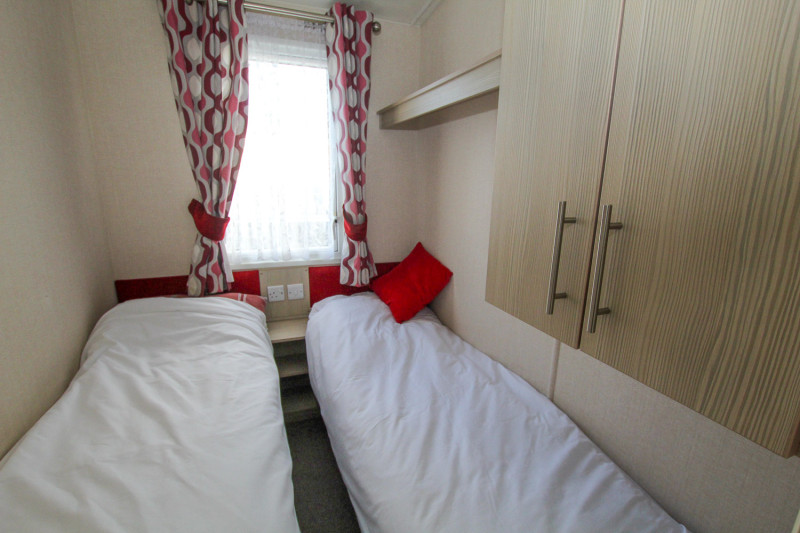 Victory Vision 2014 + decking at Pevensey Bay Holiday Park, East Sussex. 3 bedrooms / 6 berth
