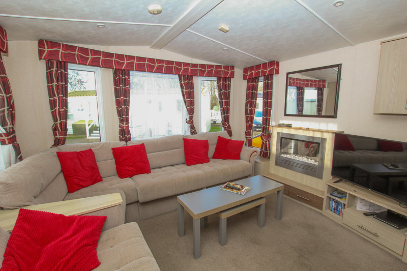 Victory Vision 2014 + decking at Pevensey Bay Holiday Park, East Sussex. 3 bedrooms / 6 berth