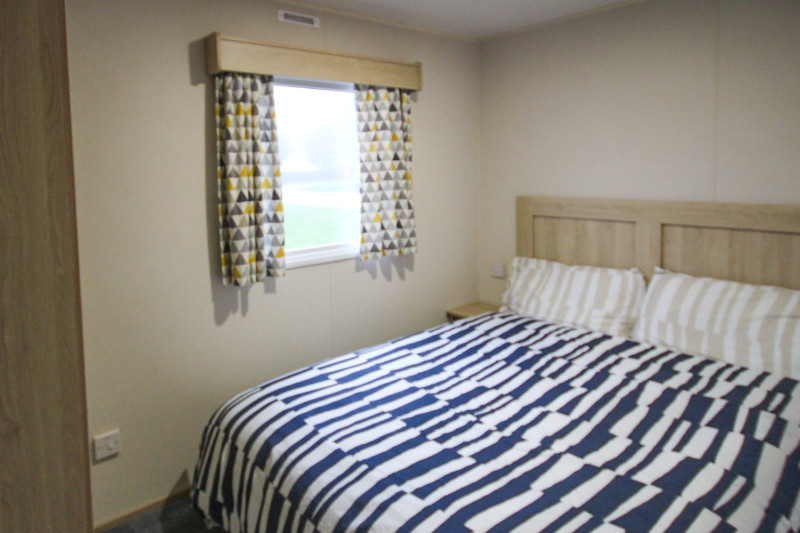 ABI New Horizon 2021 static caravan sited at Haven's Kent Coast, Allhallows. 3 bedrooms