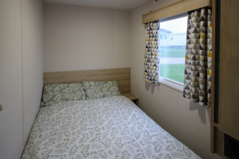 ABI New Horizon 2021 static caravan sited at Haven's Kent Coast, Allhallows. 3 bedrooms